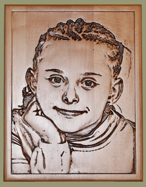 Gravure portrait d'un enfant en bois